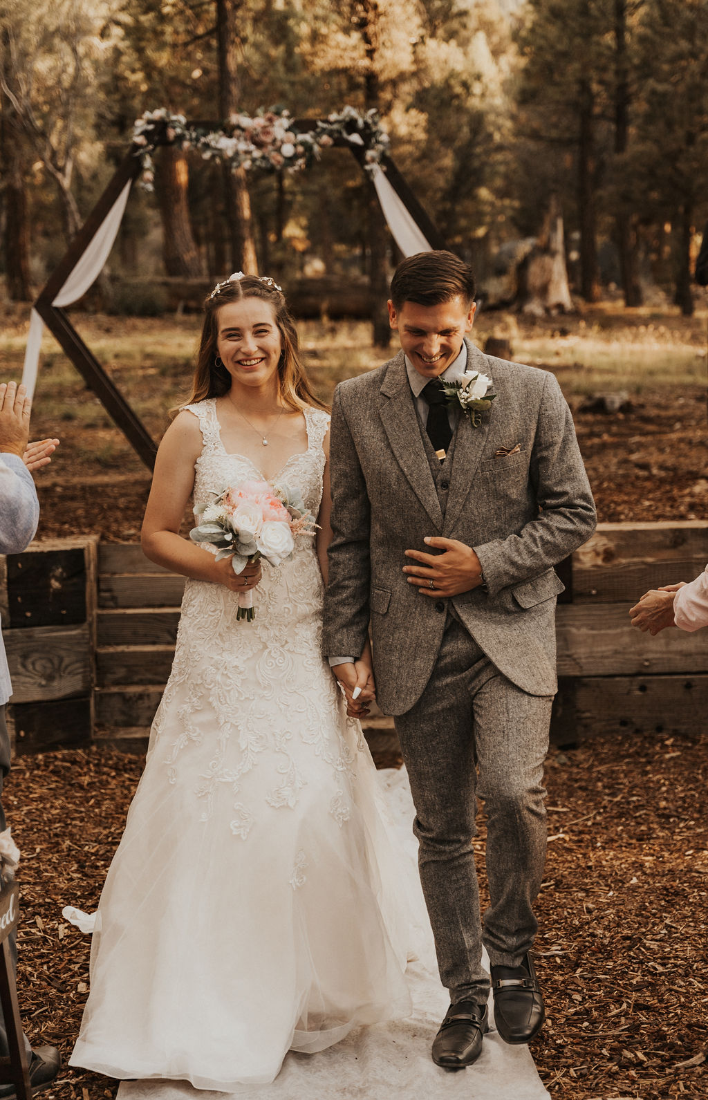 bride and groom walking down aisle after ceremony at big bear wedding venue