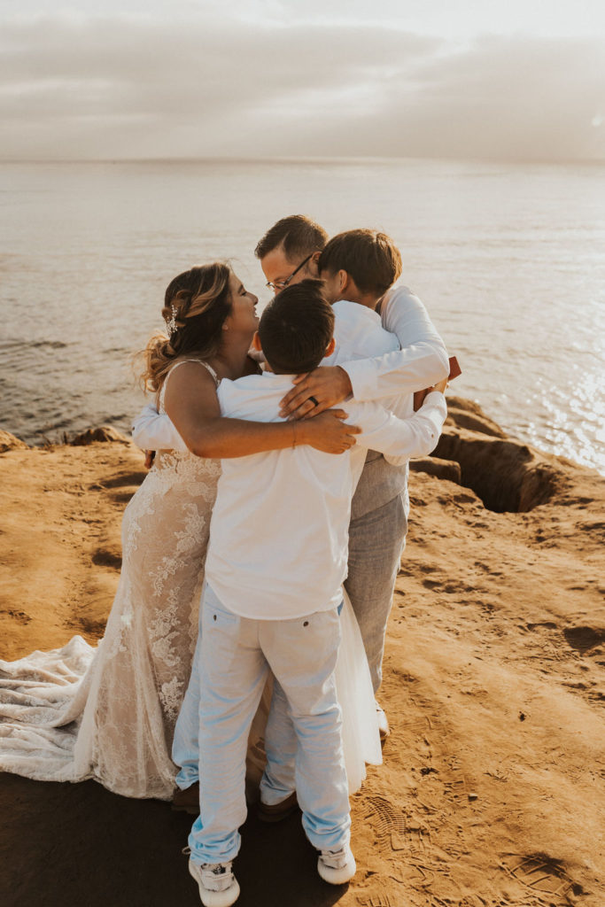 beach elopement with family at sunset cliffs