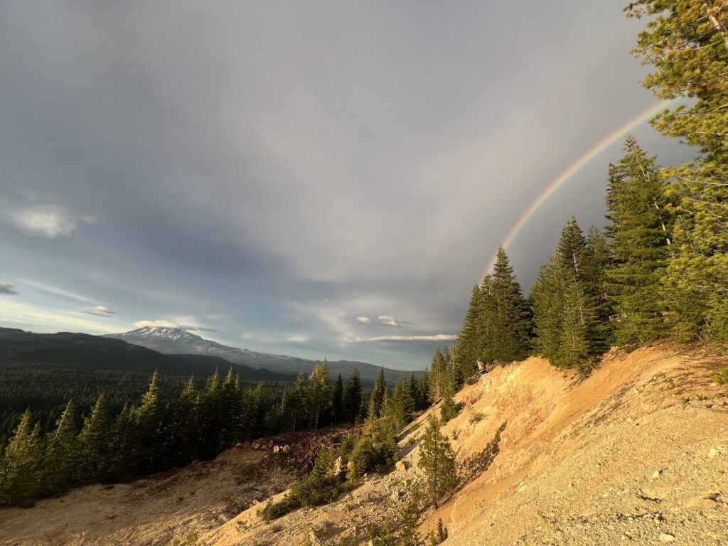 Mt. Adams camping with a rainbow in the background
