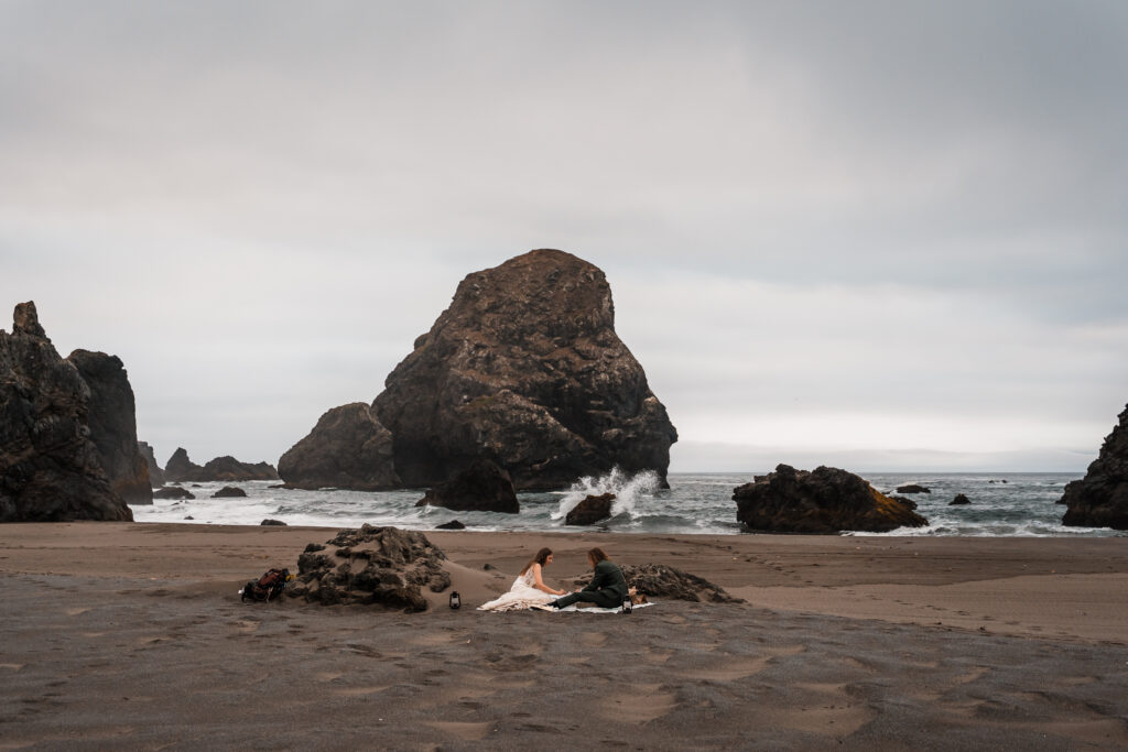 couple eating sushi on the coast